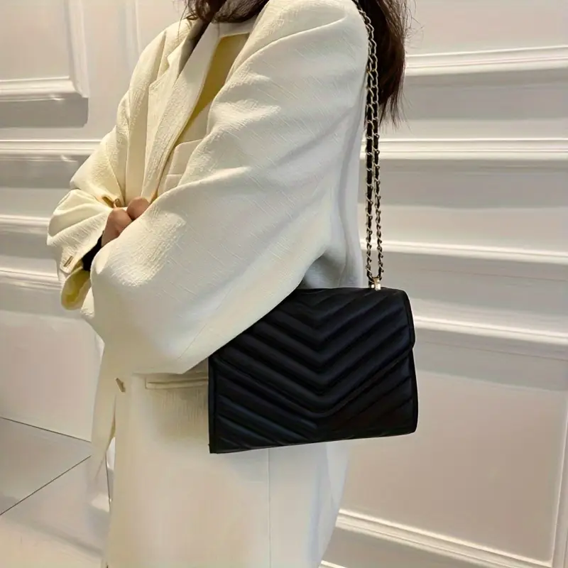 SLY envelope matelassé shoulder bag