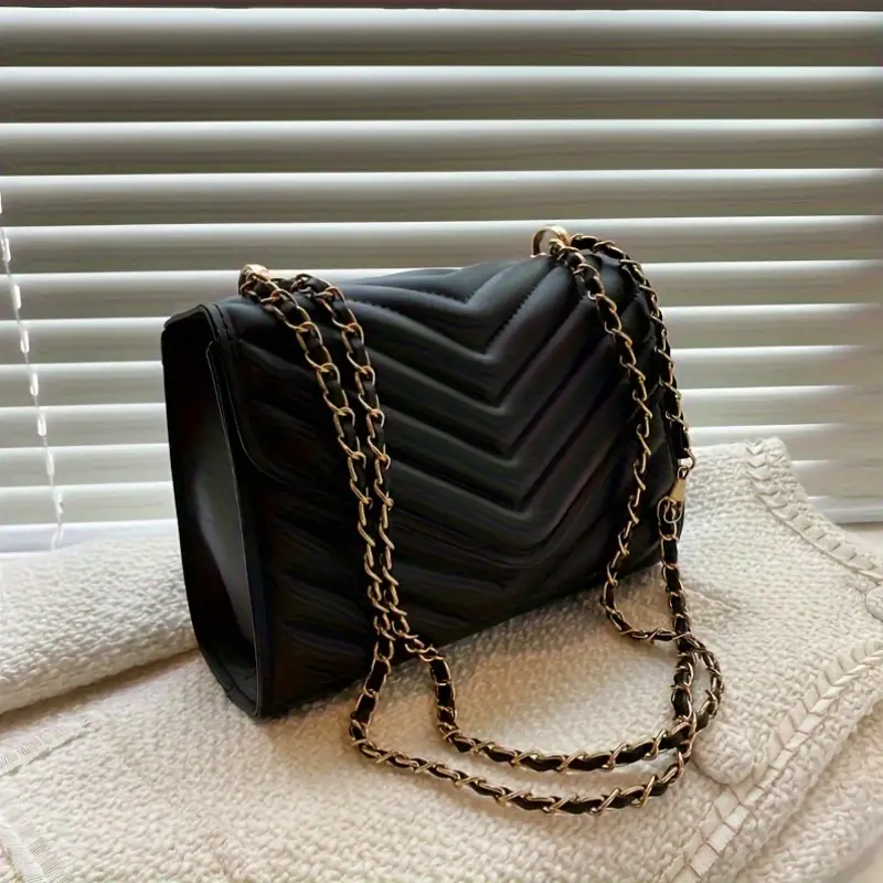 SLY envelope matelassé shoulder bag